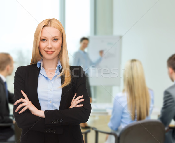 Сток-фото: улыбаясь · деловая · женщина · служба · бизнеса · дружественный · молодые