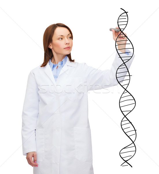 young female doctor writing dna molecule Stock photo © dolgachov