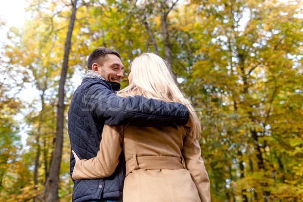 smiling couple hugging in autumn park Stock photo © dolgachov