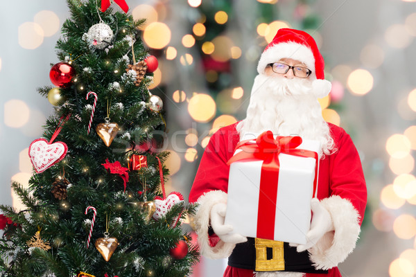 Man kostuum kerstman geschenkdoos christmas vakantie Stockfoto © dolgachov