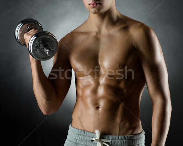 Genç spor vücut geliştirme eğitim insanlar Stok fotoğraf © dolgachov
