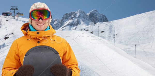Glücklich junger Mann Skibrille Berge Winter Freizeit Stock foto © dolgachov