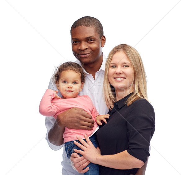 happy multiracial family with little child Stock photo © dolgachov