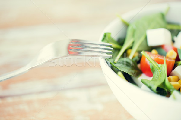 close up of vegetable salad bowl Stock photo © dolgachov