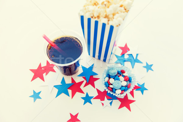 cola and popcorn with candies on independence day Stock photo © dolgachov