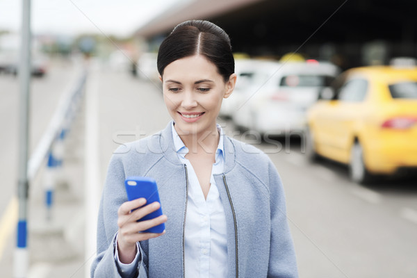 Mujer sonriente taxi ciudad viaje viaje de negocios Foto stock © dolgachov