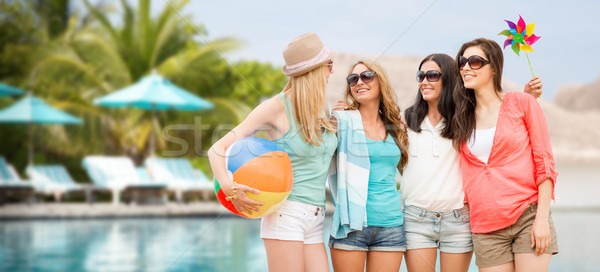 smiling girls in shades having fun on the beach Stock photo © dolgachov