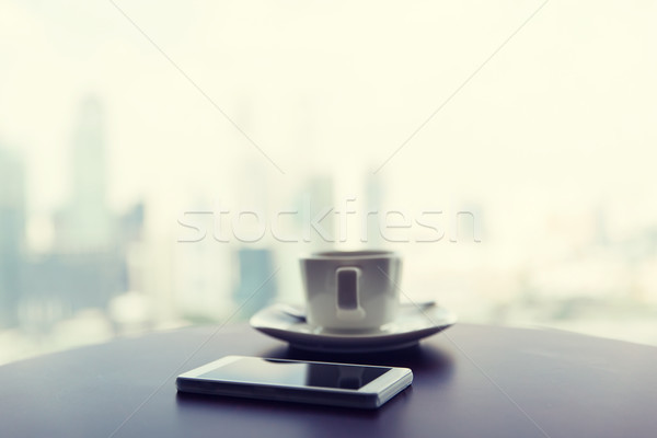 Smartphone Kaffeetasse Tabelle Technologie Business Stock foto © dolgachov