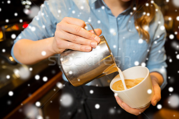 close up of woman making coffee at shop or cafe Stock photo © dolgachov