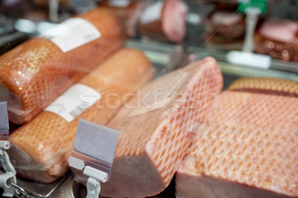 ham at grocery store stall Stock photo © dolgachov