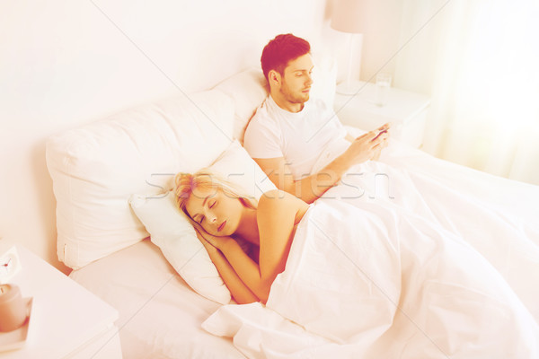 Foto stock: Homem · mensagem · mulher · adormecido · cama