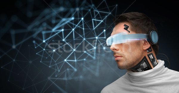 man with futuristic glasses and sensors Stock photo © dolgachov