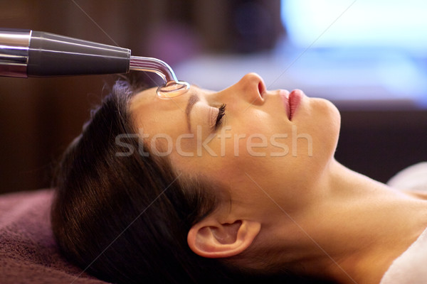 woman having hydradermie facial treatment in spa Stock photo © dolgachov