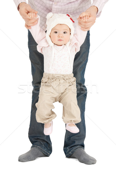 Stock photo: baby hanging on fathers hands