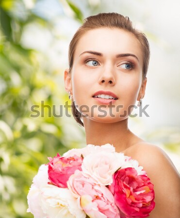 country girl with bicycle and flowers Stock photo © dolgachov