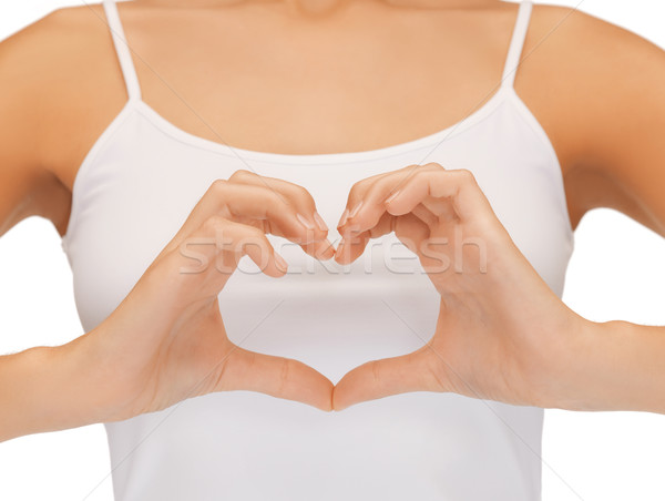 woman's hands showing heart shape Stock photo © dolgachov