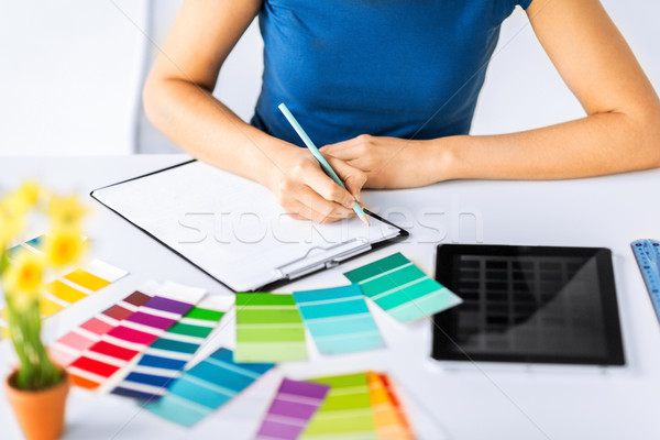 woman working with color samples for selection Stock photo © dolgachov