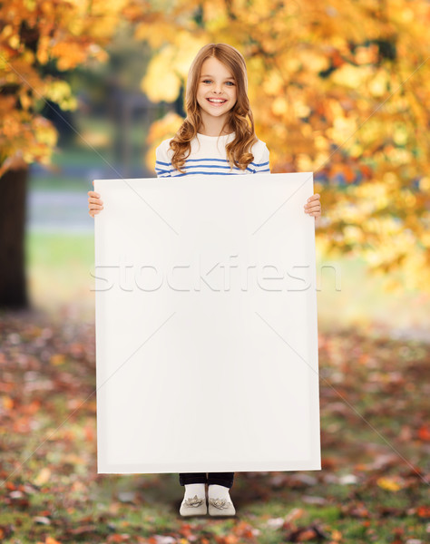 little girl with blank white board Stock photo © dolgachov