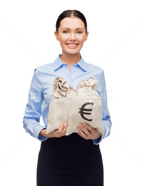 businesswoman holding money bags with euro Stock photo © dolgachov