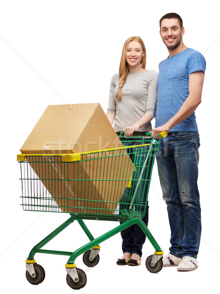 Foto stock: Sorridente · casal · carrinho · de · compras · grande · caixa · compras