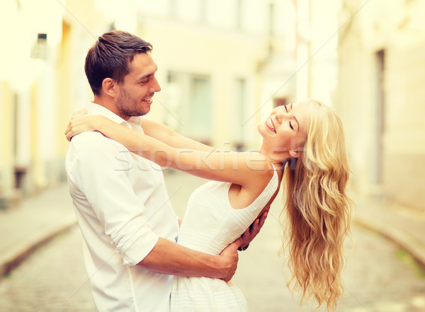 smiling couple dancing in the city Stock photo © dolgachov