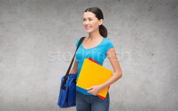 Stockfoto: Glimlachend · vrouwelijke · student · zak · mappen · onderwijs