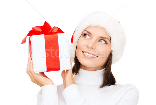 Donna sorridente helper Hat scatola regalo Natale Foto d'archivio © dolgachov