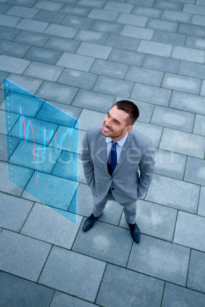 Jeunes souriant affaires extérieur haut affaires [[stock_photo]] © dolgachov