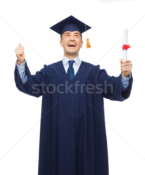 Sonriendo adulto estudiante diploma educación graduación Foto stock © dolgachov