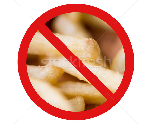 close up of french fries behind no symbol Stock photo © dolgachov