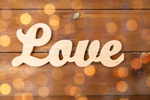 close up of word love cutout on wood Stock photo © dolgachov