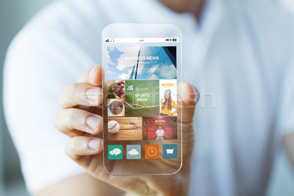 close up of male hand with news on smartphone Stock photo © dolgachov