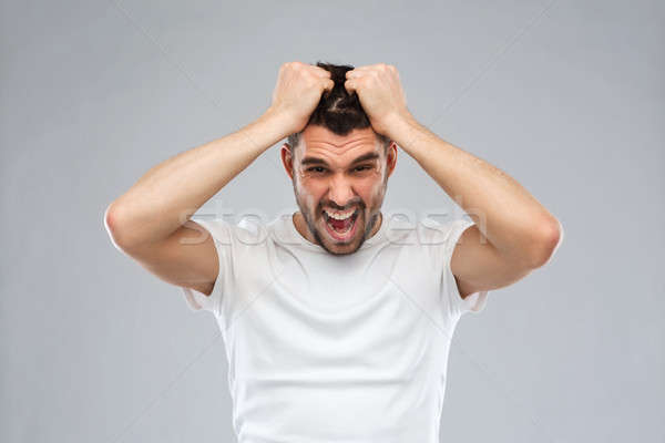 Crazy schreien Mann tshirt grau Emotionen Stock foto © dolgachov