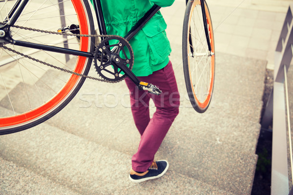man with fixed gear bike going downstairs Stock photo © dolgachov