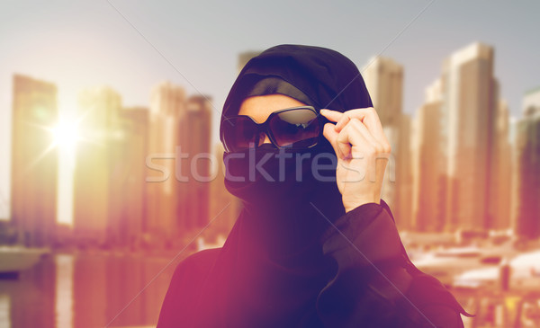 muslim woman in hijab and sunglasses in dubai city Stock photo © dolgachov