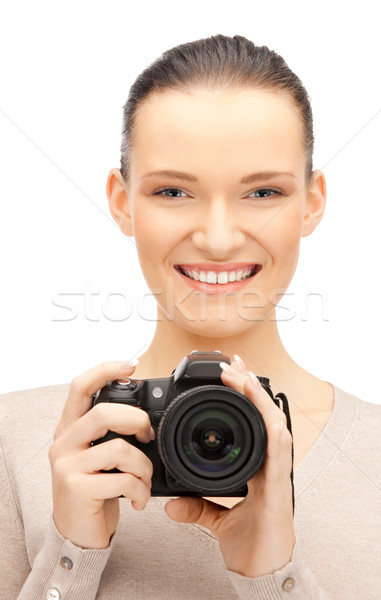 teenage girl with digital camera Stock photo © dolgachov