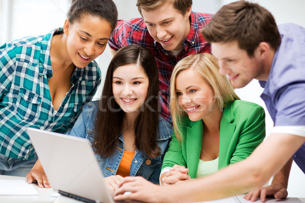 students looking at tablet pc in lecture at school Stock photo © dolgachov