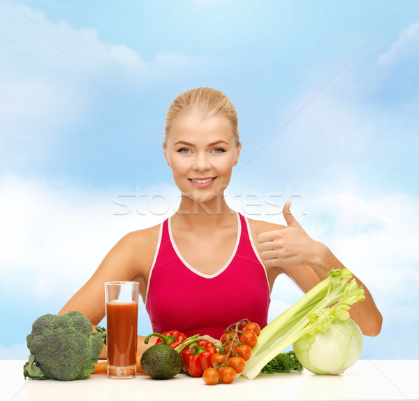 smiling woman with organic food Stock photo © dolgachov