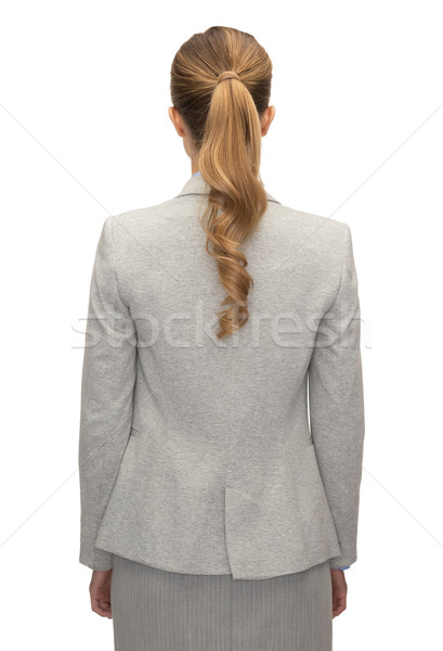 businesswoman or teacher in suit from back Stock photo © dolgachov