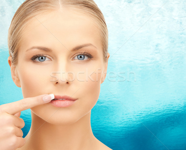 Foto stock: Hermosa · senalando · dedo · labios · belleza