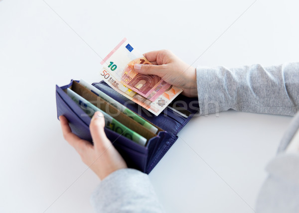 Donna mani portafoglio euro soldi Foto d'archivio © dolgachov