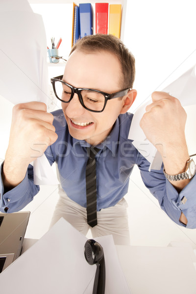 funny picture of businessman in office Stock photo © dolgachov