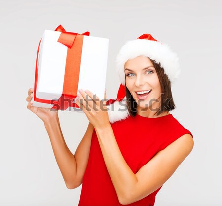 woman in santa hat taking selfie by smartphone Stock photo © dolgachov