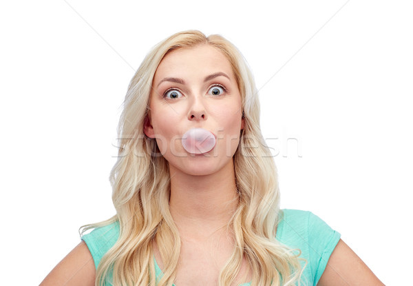 Szczęśliwy młoda kobieta guma emocje Zdjęcia stock © dolgachov