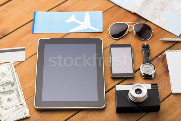 close up of smartphone and travel stuff Stock photo © dolgachov