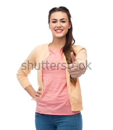 Heureux souriant jeune femme geste [[stock_photo]] © dolgachov