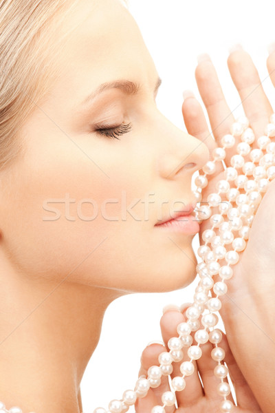 Mooie vrouw parel kralen foto vrouw gezicht Stockfoto © dolgachov