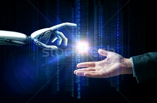 Robot emberi kéz villanás fény bináris kód mesterséges intelligencia Stock fotó © dolgachov