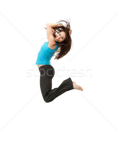 jumping sporty girl Stock photo © dolgachov