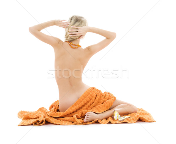 Stock photo: beautiful lady with orange towels